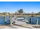 Well-maintained dock overlooking a peaceful waterfront, perfect for boating and enjoying scenic views at 1984 Kansas Ne Ave, St Petersburg, FL 33703