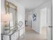 Bright hallway featuring wood floors, modern décor, and ample natural light at 1984 Kansas Ne Ave, St Petersburg, FL 33703
