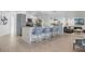 Spacious kitchen with a large center island, modern appliances, and stylish barstool seating at 1984 Kansas Ne Ave, St Petersburg, FL 33703