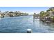 Serene waterfront view with docks and boats lining the waterway, offering a picturesque coastal living experience at 1984 Kansas Ne Ave, St Petersburg, FL 33703