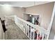 Bright loft area overlooking the living room offers an open view from the second story at 1988 Georgia S Cir, Clearwater, FL 33760