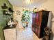 Charming pantry room featuring shelving, tiled floor, and views to the outside at 1988 Georgia S Cir, Clearwater, FL 33760