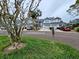 A townhouse complex with mature landscaping and ample parking at 1988 Georgia S Cir, Clearwater, FL 33760