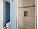 Tiled walk-in shower with built-in niche, offering a modern and functional design at 200 S Bayshore Blvd, Clearwater, FL 33759