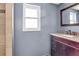 Bathroom featuring a vanity with granite counters, providing style and functionality at 200 S Bayshore Blvd, Clearwater, FL 33759