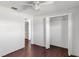Neutral bedroom features hardwood floors and access to a closet at 200 S Bayshore Blvd, Clearwater, FL 33759