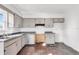 A spacious kitchen with neutral cabinetry, stainless steel appliances, and ample counter space awaits upgrades at 200 S Bayshore Blvd, Clearwater, FL 33759