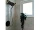 Bathroom with a modern shower head and natural light from the window at 2256 Spanish Dr # 42, Clearwater, FL 33763