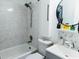 Well-lit bathroom with a bathtub and shower combination and modern fixtures at 2256 Spanish Dr # 42, Clearwater, FL 33763