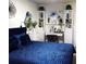 Main bedroom features an office, blue bedding and modern decor at 2256 Spanish Dr # 42, Clearwater, FL 33763