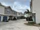 Charming townhomes with a well-maintained driveway and appealing neutral color scheme at 2900 W Azeele St # H, Tampa, FL 33609