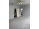 Spacious main bedroom features carpet, ensuite bathroom, and walk-in closet for ample storage at 2900 W Azeele St # H, Tampa, FL 33609