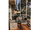 Cozy screened porch with stylish patio furniture, offering a relaxing outdoor space with a clear view at 2900 W Azeele St # H, Tampa, FL 33609