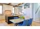 Beautiful kitchen featuring a brick backsplash, ample white cabinets, and an island with barstool seating at 39 W Spanish Main St, Tampa, FL 33609