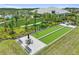 Enjoy a game of bocce ball on these pristine courts with seating, surrounded by lush landscaping and the clubhouse at 4228 Isonzo Way, Wesley Chapel, FL 33543
