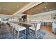 Bright clubhouse offers a spacious common area with a tall table and chairs and a counter with seating at 4228 Isonzo Way, Wesley Chapel, FL 33543
