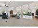 Bright gym space with state-of-the-art equipment and natural light, perfect for an active lifestyle at 4228 Isonzo Way, Wesley Chapel, FL 33543