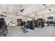 Bright gym featuring high ceilings, fans, and weight training equipment at 4228 Isonzo Way, Wesley Chapel, FL 33543