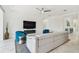 Modern living room boasts sleek furniture, fireplace, and a sophisticated aesthetic at 4228 Isonzo Way, Wesley Chapel, FL 33543