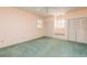 Sunny bedroom featuring a window seat between two large closets at 4315 W Cleveland St, Tampa, FL 33609