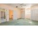 Spacious bedroom with a ceiling fan and carpeted flooring at 4315 W Cleveland St, Tampa, FL 33609