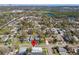 An aerial view of a home in a neighborhood with lush landscaping and a pin marking the location at 4501 24Th S Ave, St Petersburg, FL 33711