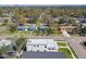 Aerial view of residential area showcasing modern home design, landscaping, and street access at 4501 24Th S Ave, St Petersburg, FL 33711