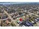 An aerial view of a home in a residential neighborhood with mature trees near the bay at 4501 24Th S Ave, St Petersburg, FL 33711