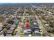 Aerial view of a modern two-story home in an established neighborhood with mature trees at 4501 24Th S Ave, St Petersburg, FL 33711