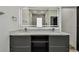 Modern bathroom with double marble vanity, large, illuminated mirror, and contemporary fixtures at 4501 24Th S Ave, St Petersburg, FL 33711