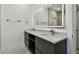 Modern bathroom with double marble vanity, large, illuminated mirror, and contemporary fixtures at 4501 24Th S Ave, St Petersburg, FL 33711