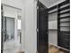 View into a Primary suite featuring a large walk-in closet and adjacent ensuite bathroom at 4501 24Th S Ave, St Petersburg, FL 33711