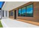 Modern front porch featuring wood-look siding and a minimalist aesthetic at 4501 24Th S Ave, St Petersburg, FL 33711