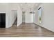 Bright, open living room featuring wood floors, high ceilings and large windows that bring in an abundance of natural light at 4501 24Th S Ave, St Petersburg, FL 33711