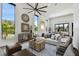 A modern living room has lots of natural light and contemporary decor at 4501 24Th S Ave, St Petersburg, FL 33711