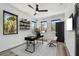Modern office space with a sleek desk, comfortable seating, large windows, and contemporary shelving at 4501 24Th S Ave, St Petersburg, FL 33711
