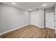 A serene bedroom features neutral walls, modern flooring, and a closet for storage at 5433 Chestnut Ridge Rd, Dade City, FL 33523