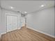 A bright bedroom features neutral walls, modern flooring, and a closet for ample storage at 5433 Chestnut Ridge Rd, Dade City, FL 33523