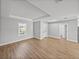 Inviting living room showcasing recessed lighting and a large window for natural light at 5433 Chestnut Ridge Rd, Dade City, FL 33523