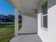 Wide covered patio offering ample space with a view of the neighborhood at 5433 Chestnut Ridge Rd, Dade City, FL 33523