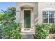 Close-up of the front door with a decorative wreath, and a Ring doorbell camera at 6785 47Th N Ln, Pinellas Park, FL 33781