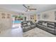 Inviting living room showcasing sliding glass doors that lead to the outdoor pool area at 6791 17Th N St, St Petersburg, FL 33702