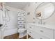 Charming bathroom featuring a shower-tub combo and a modern vanity with a round mirror at 701 Mirror Lake N Dr # 216, St Petersburg, FL 33701