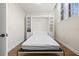 Murphy bed with built-in shelving, ready for comfortable sleeping and maximizing space in the room at 701 Mirror Lake N Dr # 216, St Petersburg, FL 33701