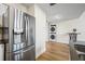 Modern kitchen featuring stainless steel appliances and laundry area at 701 Mirror Lake N Dr # 216, St Petersburg, FL 33701