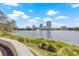 Scenic view of the downtown skyline across the lake, showing the lush green landscape at 701 Mirror Lake N Dr # 216, St Petersburg, FL 33701