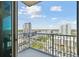 Balcony overlooking the city with clear blue skies and modern railing at 777 N Ashley Dr # 1509, Tampa, FL 33602