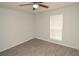 Bright bedroom with a ceiling fan and ample natural light, creating a cozy atmosphere at 8659 Fancy Finch Dr # 202, Tampa, FL 33614