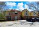 Charming two-story condo building with brick and siding exterior and ample parking at 8659 Fancy Finch Dr # 202, Tampa, FL 33614