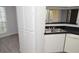 A functional kitchen featuring a stainless steel sink, ample cabinet space, and natural light at 8659 Fancy Finch Dr # 202, Tampa, FL 33614